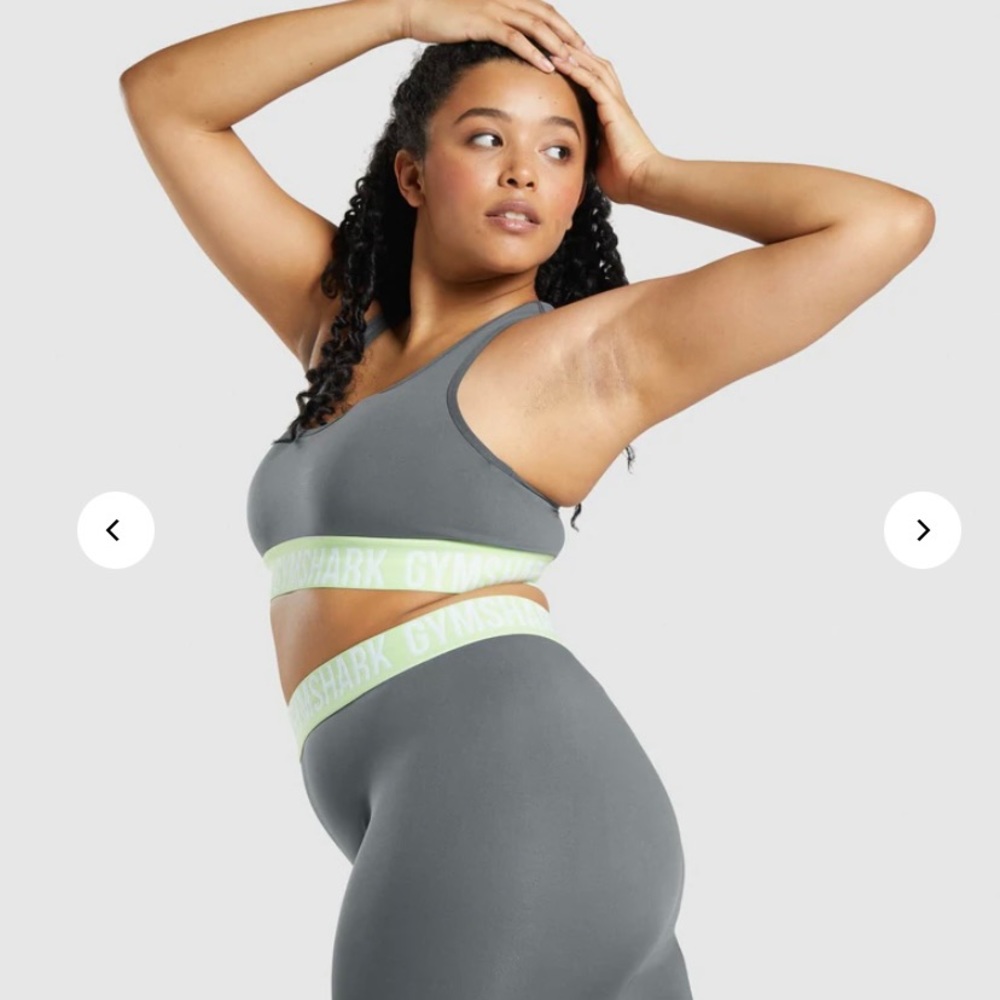 Grey and lime green Gymshark sports bra with removable padding.